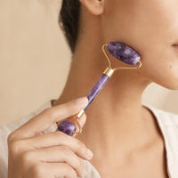 Using the amethyst roller on the face