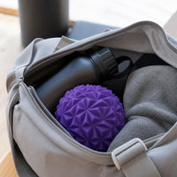 Massage ball packed in a gym bag
