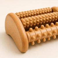 Close-up of the ridges and nodes on the wooden foot roller