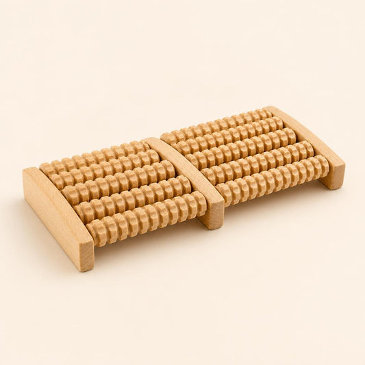 Heldson Dual Wooden Foot Massage Roller on warm cream background